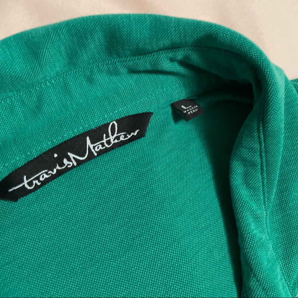 Travis Mathews men’s L golf polo.